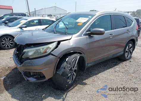 2015 Honda Cr-V Touring z USA, uszkodzony, nr VIN 5J6RM4H98FL126114